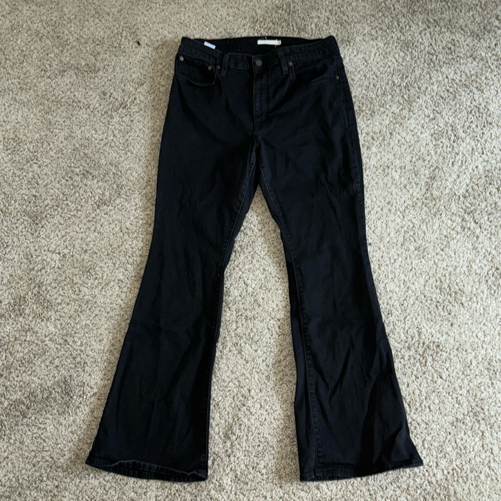 Levi’s black flare jeans. Size: W33 L32
